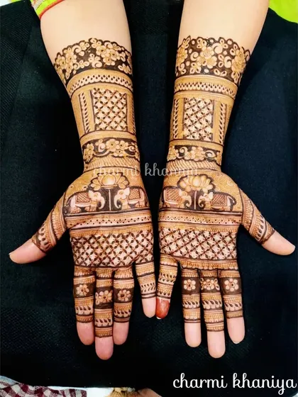 I love incorporating elephants into my designs! This traditional pattern features majestic elephants under a lotus canopy, combined with detailed check and floral work on the wrists.