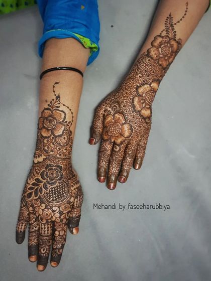 A two-hand view, showing one with fresh paste and the other with the beautiful stain.