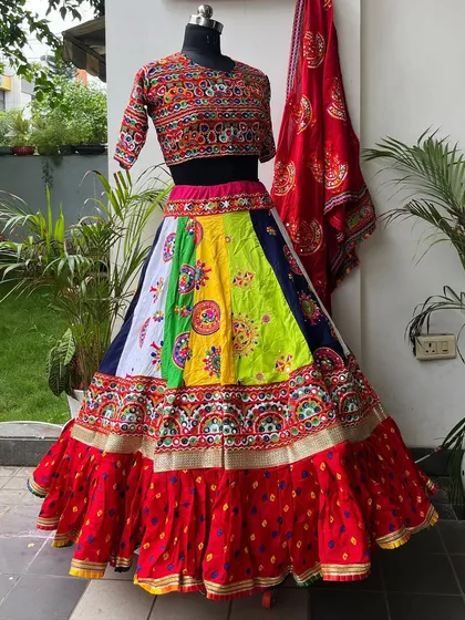 The full view of this magnificent, colorful lehenga. It’s designed to have a huge flair, making it perfect for twirling.
