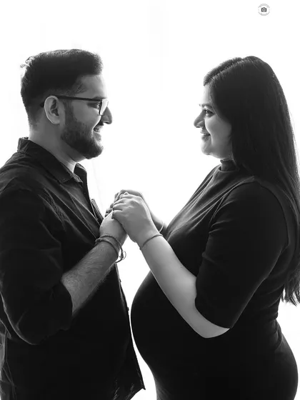 A timeless black and white silhouette. This style of maternity photography is so elegant and focuses on the couple's bond and the beautiful baby bump.