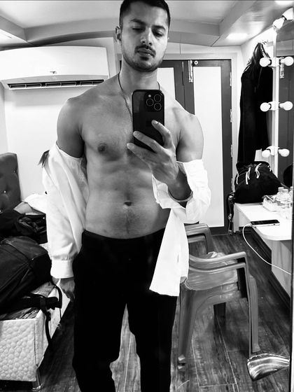 A quick selfie from the vanity room before a shoot. The life of a model often involves a lot of waiting, but staying ready is part of the job.