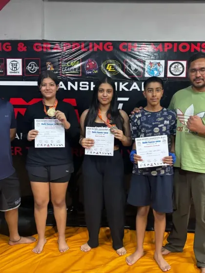 Our students and coaches after a successful campaign at the Delhi Olympics Savate Games 2025, proudly displaying their medals and certificates.
