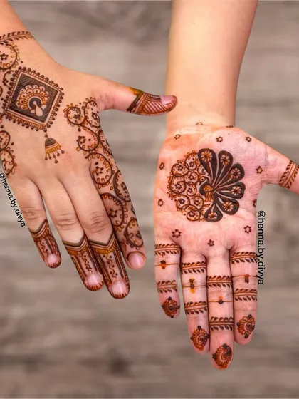 This shows how you can have two different styles that work beautifully together. One hand has a modern geometric design, while the other features a more traditional floral fan motif for a personalized look.