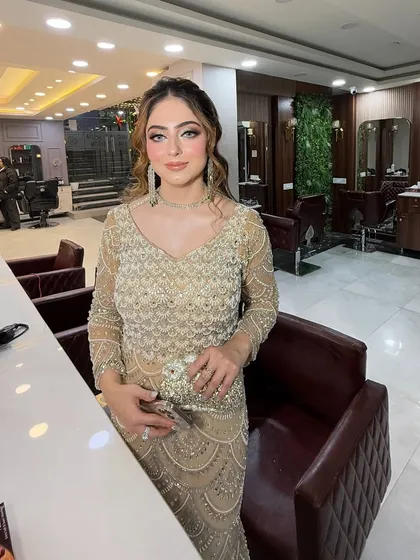 A beautiful portrait of the client, showcasing her radiant makeup.
