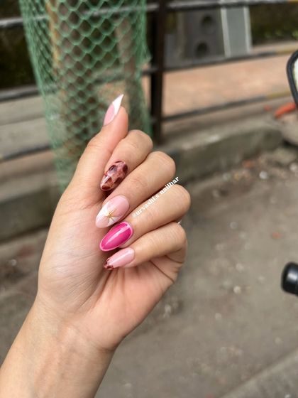 A fun and eclectic set combining a pop of magenta, a touch of tortoiseshell, and a modern white swirl. This shows how you can mix and match different styles for a unique look.