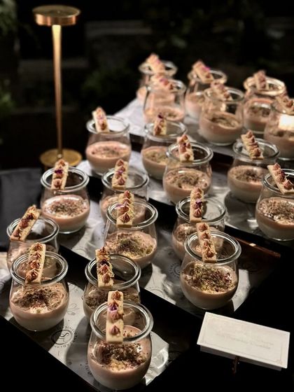 A closer shot of the Kalakand & Rose Mousse dessert jars.