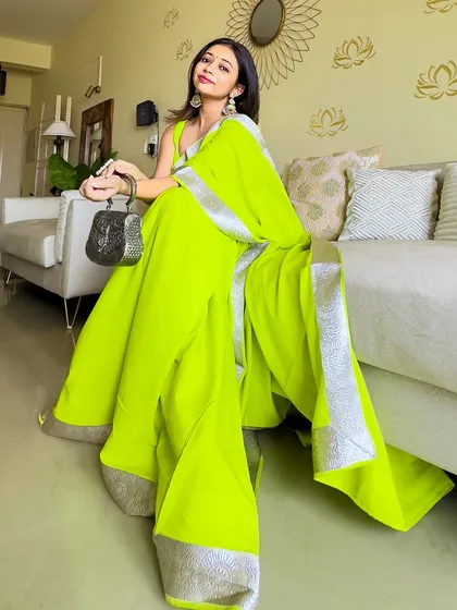 Don't let anyone tell you what colours to wear! I believe in rocking what makes you feel confident, like this vibrant neon green saree. It’s a timeless colour that always makes a statement, perfect for my Brown Girlies.