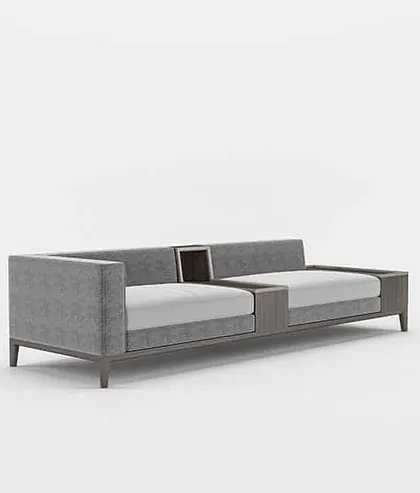 Another angle of our modern sofa, showcasing its sophisticated grey upholstery and the warm tone of the built-in wooden elements.