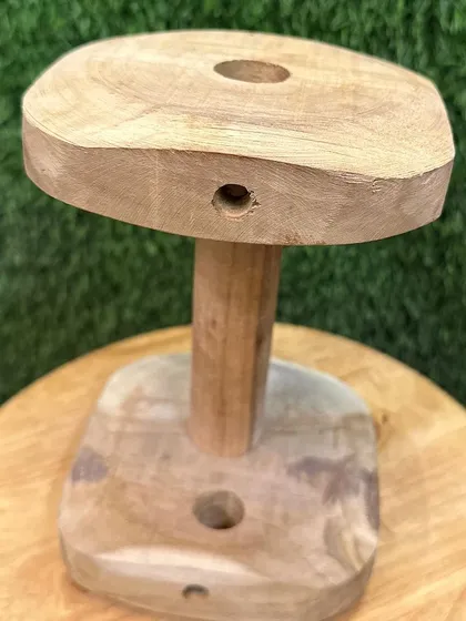 Another view of the wooden training dumbbell, showing its sturdy construction. This is a professional-grade tool for dedicated trainers and owners.