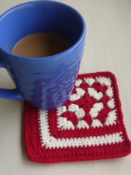 A simple granny square makes a perfect coaster. This is one of the first projects many beginners make, and it's a quick and satisfying way to practice your stitches.