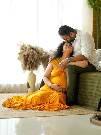 A peaceful moment in our boho-inspired studio corner. The warm lighting and natural textures create a serene atmosphere for your portraits.