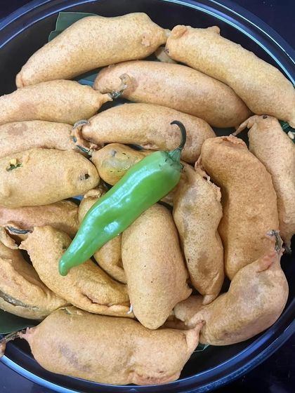 Crispy and spicy Mirchi Vada, a classic snack that I included in a recent South Indian meal delivery. Perfect for a lazy Sunday.