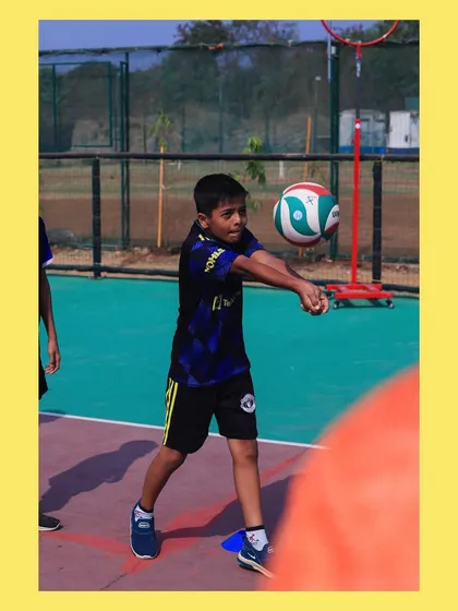 A U-14 player practices his underarm pass, focusing on a solid stance and clean contact with the ball. Fundamentals are the foundation of every great player.