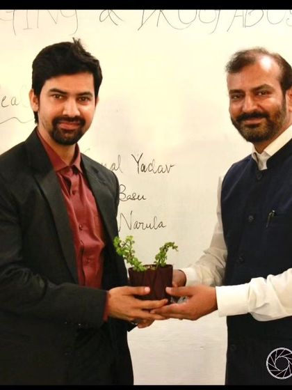 Receiving a plant as a token of appreciation at Amity University. This moment was a powerful response to the doubts I faced when I first applied to law school.