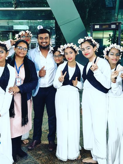 Another group of happy students in their performance attire at the Ryan Festival. My goal is to make every child feel like a star on stage.