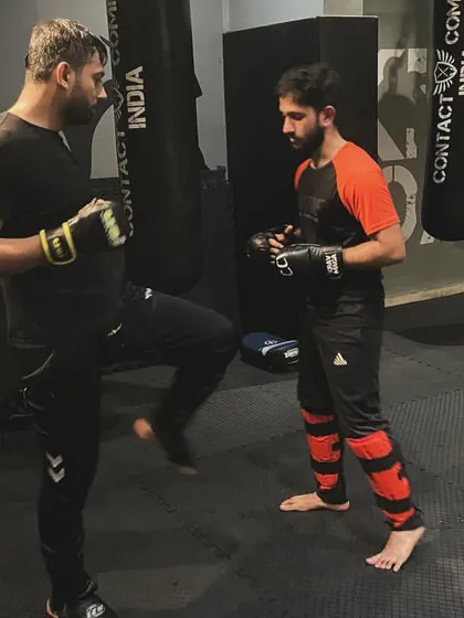 Two students practice their blocking and striking. This kind of partner work is key to understanding how techniques work against a live person.