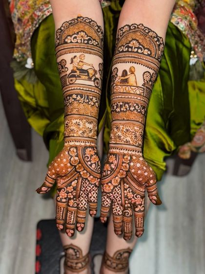 This design tells the story of the couple's first ride together on a scooter. It's these little personal moments that make a bridal mehendi design truly one of a kind.