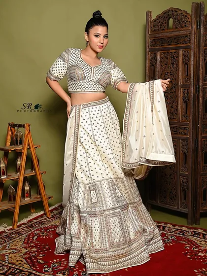 This shot captures the flow and movement of the lehenga and dupatta. I encourage models to interact with their outfits to create dynamic images that feel natural and unposed.