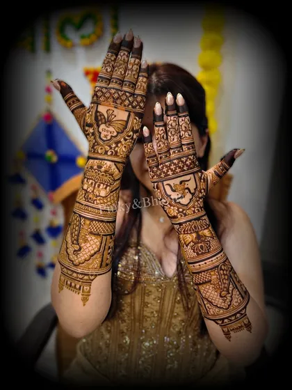 Another angle of the bride's full wedding mehndi, showing the rich detail and traditional figures that make it so special.