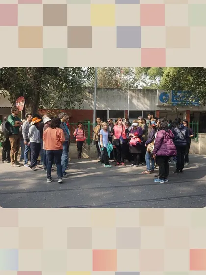 A group gathers for a walk starting near Hindu Rao Hospital. The walk covers the history of the Ridge, a crucial battleground during the 1857 uprising.