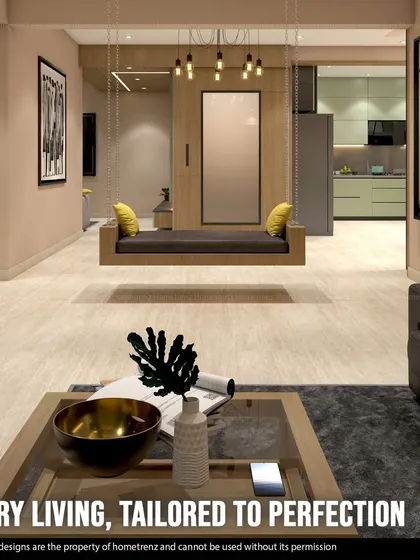 I believe in luxury living, tailored to perfection. This open-concept space features a statement indoor swing, a comfortable leather sofa, and a clear view into the modern kitchen, creating a cohesive and stylish home.