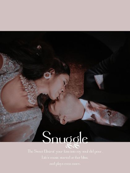 An artistic overhead shot of the couple sharing a kiss, titled "Snuggle." This unique perspective creates a sweet and intimate portrait.