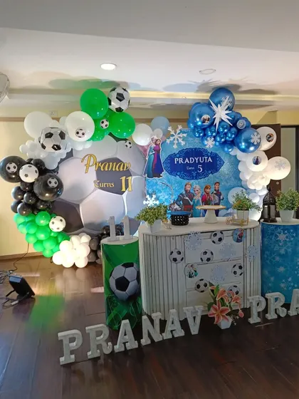A full view of the combined party setup, showing how I balanced both the football and Frozen themes.