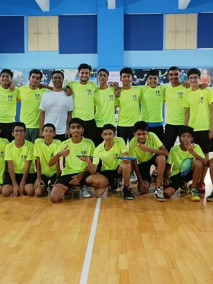 Our 2022 junior and teen boys' batch. We create a focused yet fun environment where young male players can challenge themselves and improve their badminton skills.