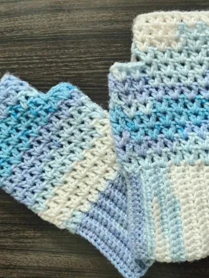 These ombre fingerless gloves in shades of blue and white are so dreamy. The yarn creates a beautiful gradient effect, making each pair unique.