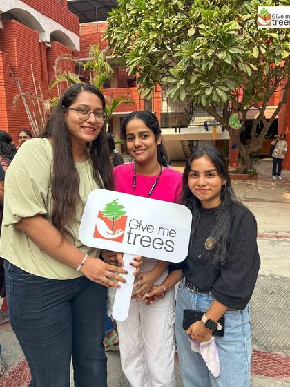 Students from Shyama Prasad Mukherji College, Delhi University, pose with our banner after an insightful session on environmental sustainability.