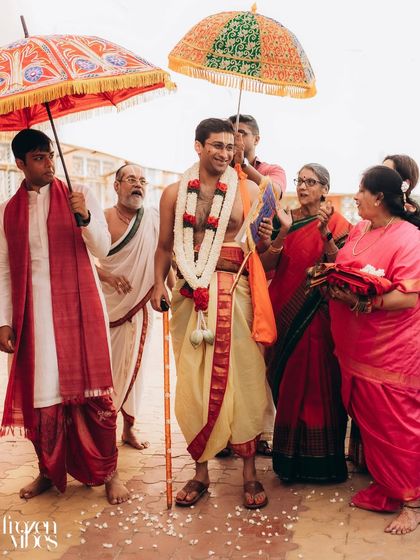 The groom's procession during the Kashi Yatra ritual in a South Indian wedding. I capture the unique traditions and playful moments of every culture I photograph.