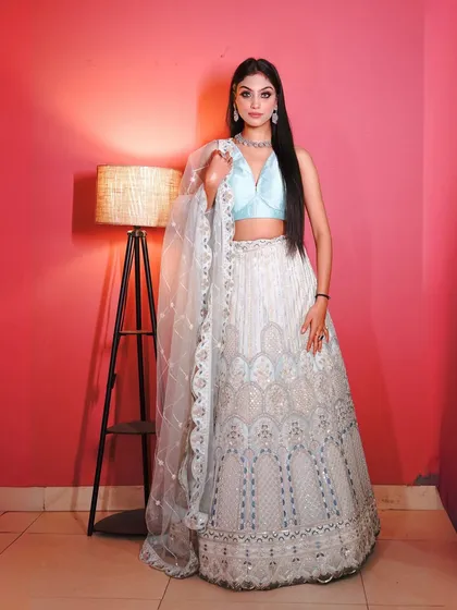 The complete look from head to toe. This ice blue lehenga is a versatile piece for any MUA's portfolio.
