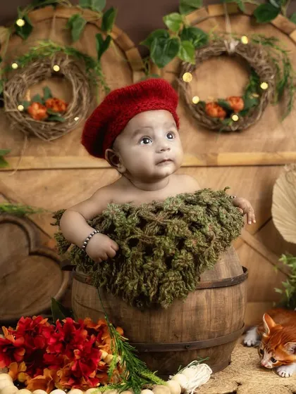 A curious upward glance. Even at two months old, we can capture beautiful, alert expressions in a comfortable and safe setting.