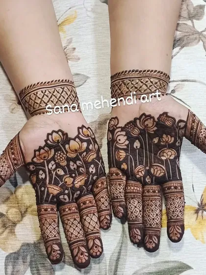 A unique and stylish design with a field of lotus flowers on the back of the hands. The simple cuff and patterned fingers make this a very modern and beautiful choice.