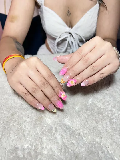 A fun and colorful set with pink and yellow ombre, accented with 3D flowers. This is a great example of a bright, summery design.