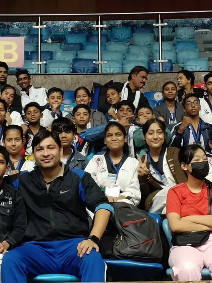 Our team in the stands at the national championship. The camaraderie and support among students is a key part of our culture.
