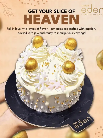 Your slice of heaven. This elegant white cake is decorated with golden spheres and delicate silver sprinkles, offering a look of minimalist luxury for any celebration.