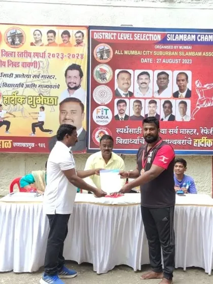 One of my senior students receiving his medal. This kind of experience is invaluable for building the confidence needed for real self-defense.