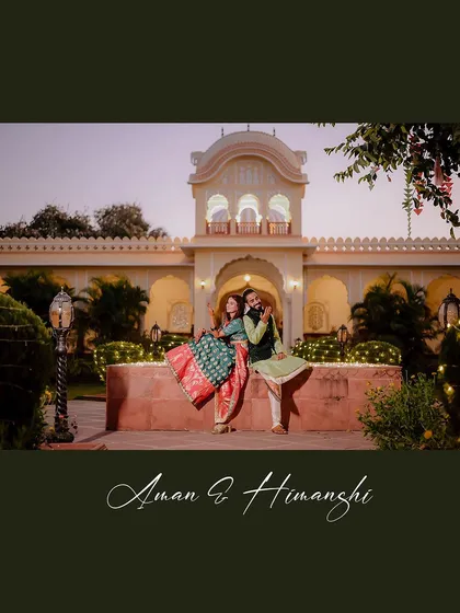 A playful and romantic shot from the Mehendi ceremony in Orchha. The bride showing off her lehenga while sitting with her groom captures the happy and relaxed vibe of the day.