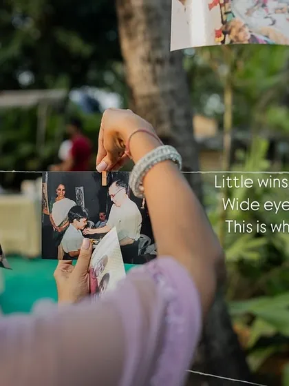 Little wins and scraped knees. The bride hangs photos from her childhood, sharing the dreams and memories of where it all began.