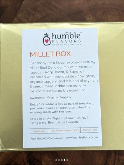 This is my Millet Box, a curated selection of my three millet laddus. The label clearly lists the ingredients and the use of organic jaggery, with no sugar or preservatives. The sturdy golden box makes it a perfect gift for health-conscious friends and family.