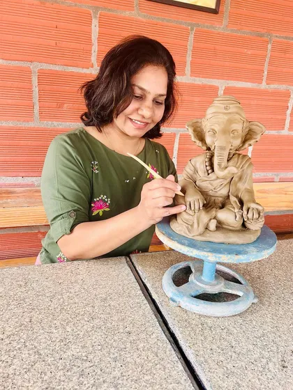 A happy moment for me, putting the final touches on a Ganesha idol at the studio.