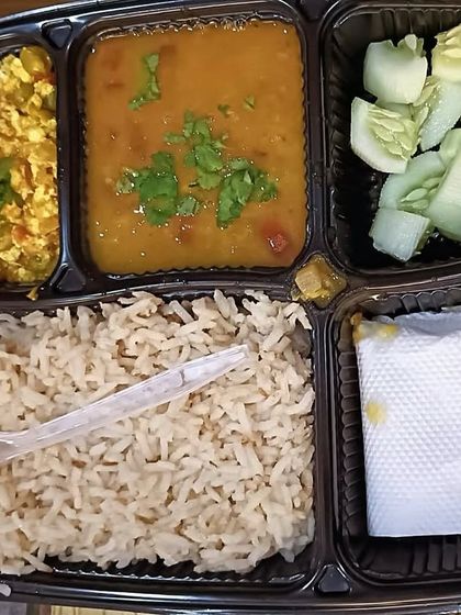 A customized diet meal with brown rice, rajma, and paneer bhurji. A high-protein, high-fiber meal to support your fitness goals.