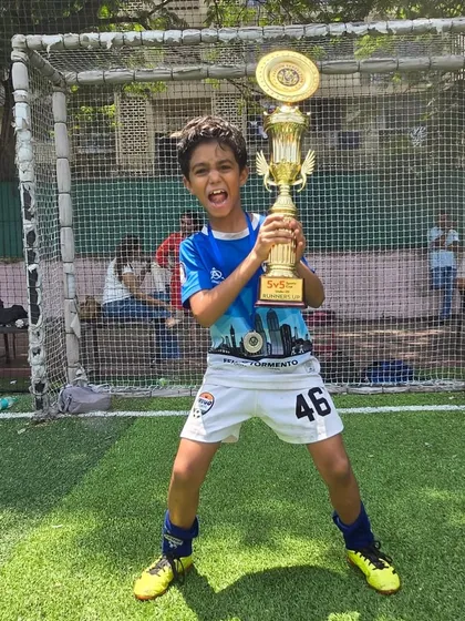 A celebratory roar from Aarav Salvi of the U-9 team with his trophy.