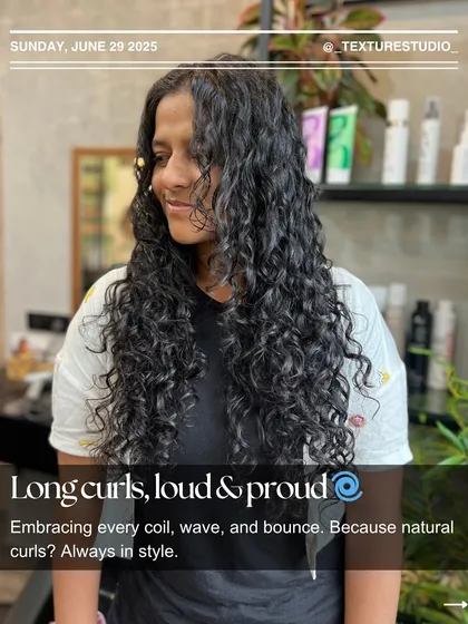 Long curls, loud and proud. I love working with long curly hair to ensure every coil is defined and full of life, proving that natural curls are always in style.