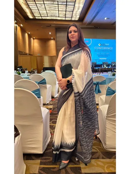 A full-length portrait taken at a legal conference. I believe in continuous learning, and attending such events helps me stay ahead in this ever-evolving field, reinforcing my commitment to my profession.