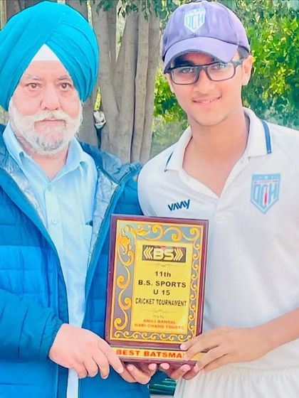 Laksh Narang receiving the Best Batsman award. His runs were crucial for our victory.