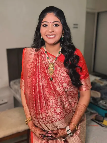 The full look, showing how the traditional attire and classic makeup come together for a timeless and elegant baby shower style.