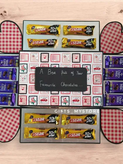 The second layer of the surprise phone gift box, filled with 5 Star and Dairy Milk chocolates. Every layer is a treat!