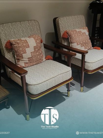 Another look at our comfortable and stylish mid-century modern chair set. The ergonomic design and plush cushions make them perfect for long conversations and relaxation.